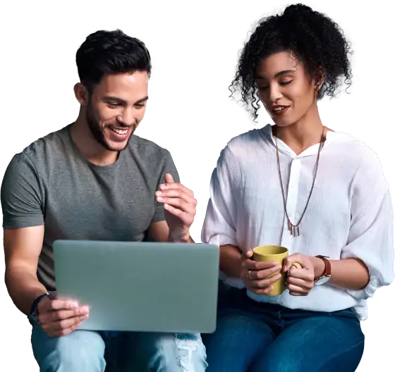 A black woman sitting in a white blouse and blue jeans, next to her a white man in a gray blouse sitting with a notebook